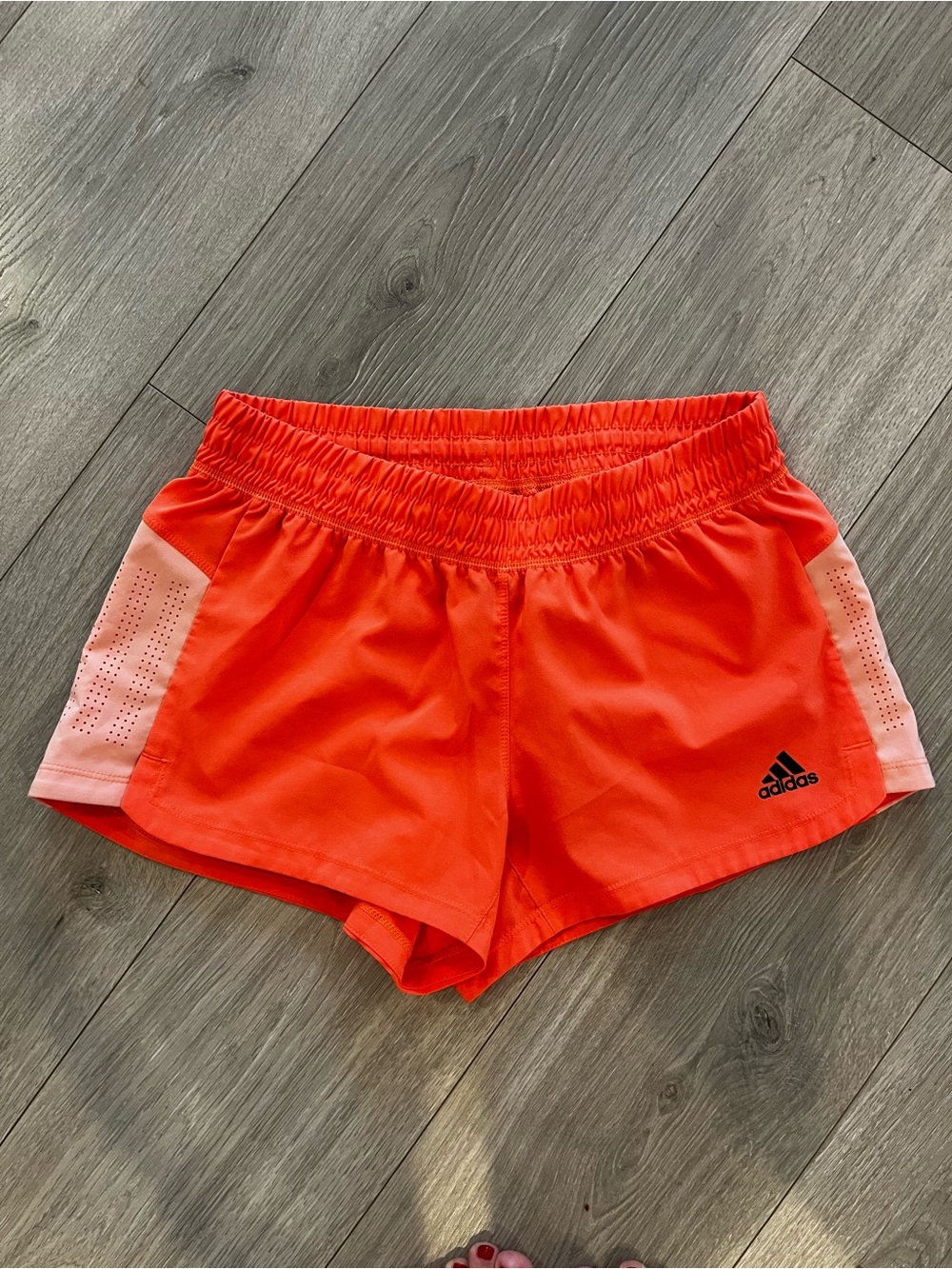 adidas Women's Bright Orange Athletic Shorts with Light Pink Panels